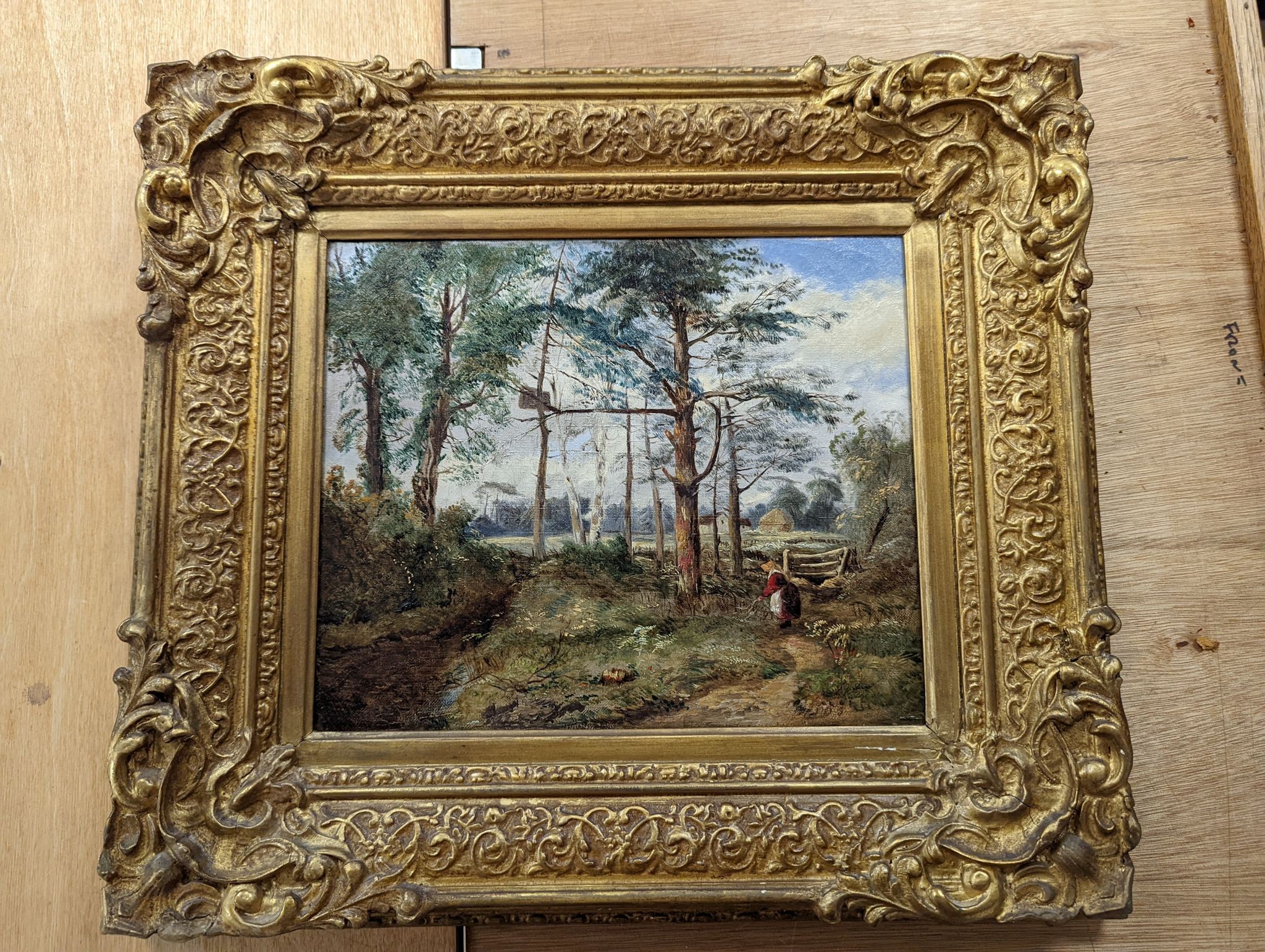 19th century English School, oil on canvas, Woodland scene with faggot gatherer, 25 x 30cm